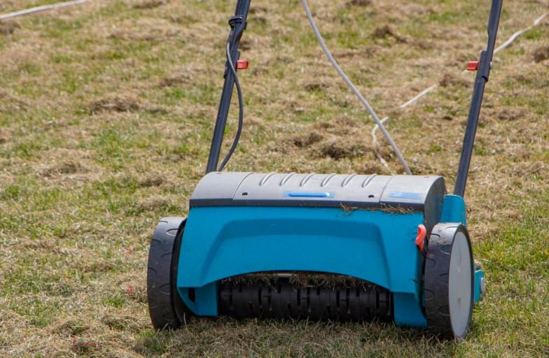 Lawn aerator in a garden